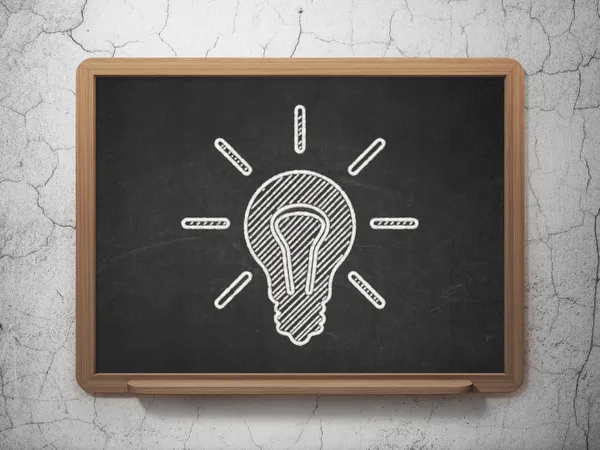 Finance concept: Light Bulb on chalkboard background — Stock Photo, Image