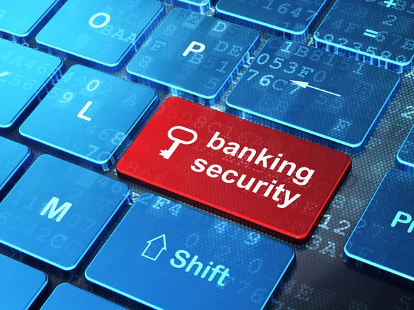 Концепция безопасности: Ключ и банковская безопасность на фоне клавиатуры компьютера — стоковое фото