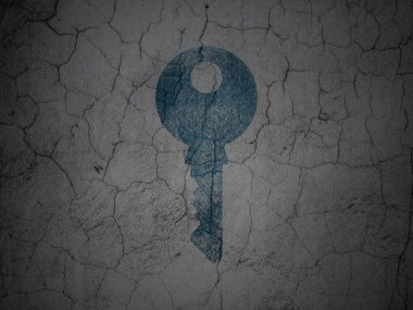 Emniyet konsepti: grunge duvar arka plan üzerinde anahtar