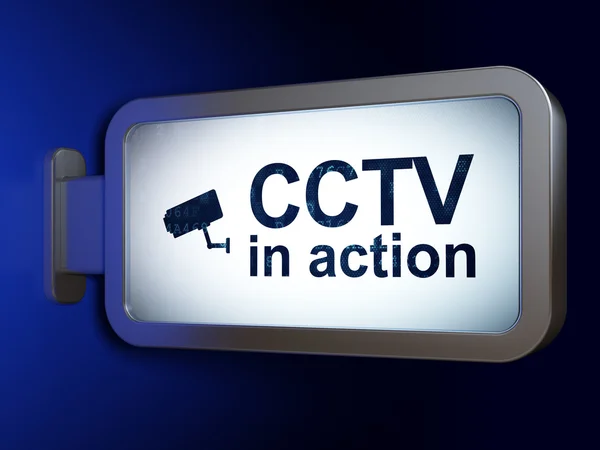 Veiligheidsconcept: cctv in actie en cctv camera op billboard achtergrond — Stockfoto