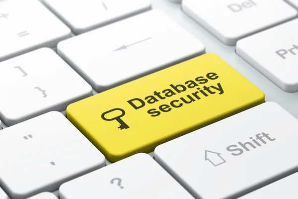 Sicherheitskonzept: Schlüssel- und Datenbanksicherheit im Hintergrund der Computertastatur — Stockfoto
