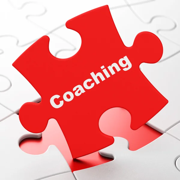Onderwijs concept: coaching op puzzel achtergrond — Stockfoto