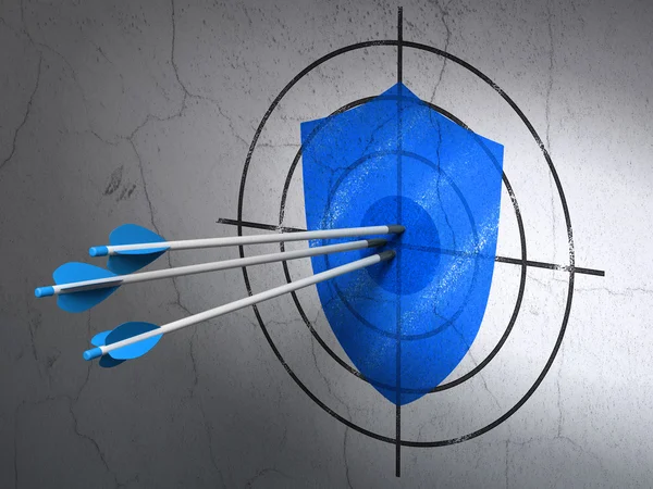 Privacy concept: arrows in Shield target on wall background — Stock Photo, Image