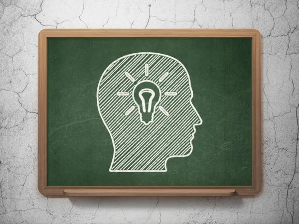 Information concept: Head With Light Bulb on chalkboard background — Stock Photo, Image