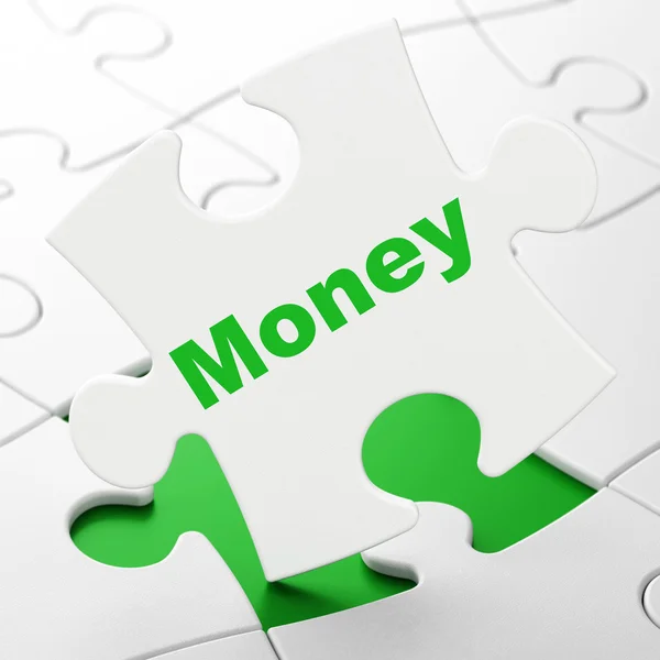 Finanční koncept: peníze na pozadí puzzle — Stock fotografie