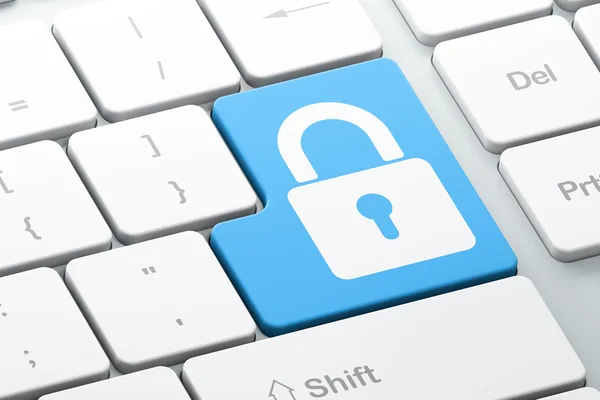 セキュリティの概念: コンピューターのキーボードの背景にロックされた南京錠 — ストック写真