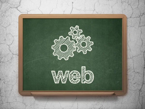 Web 開発の概念: 歯車と黒板背景に web — ストック写真