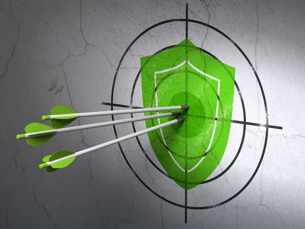 Privacy concept: arrows in Shield target on wall background — Stock Photo, Image