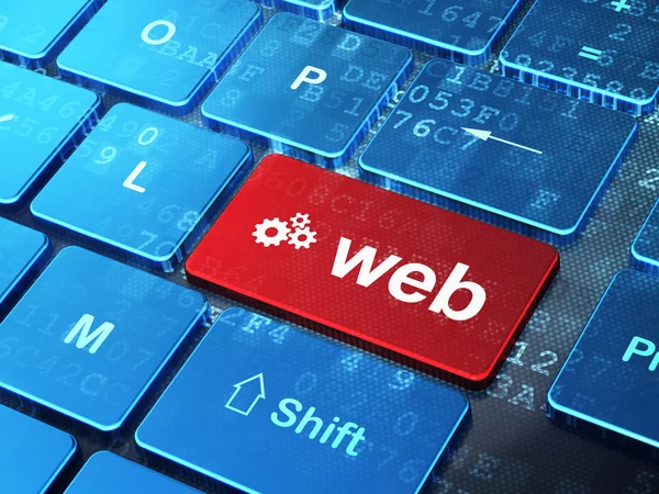 Concepto de desarrollo web: Engranajes y Web en el fondo del teclado del ordenador —  Fotos de Stock