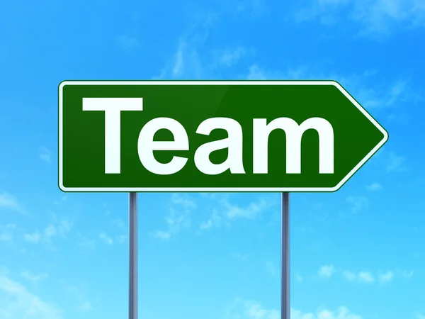 Business concept: Team on road sign background — Stock Photo, Image