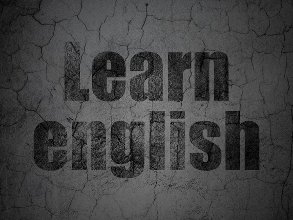 Vzdělávací koncepce: učit se anglicky na grunge stěna pozadí — Stock fotografie