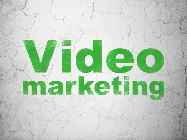 Affärsidé: Video marknadsföring på väggen bakgrund — Stockfoto