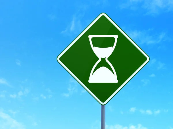 Timeline concept: Hourglass on road sign background — Stock Photo, Image