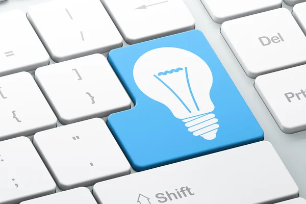 Business concept: Light Bulb on computer keyboard background — Stock Photo, Image