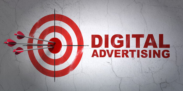 Marketing concept: target and Digital Advertising on wall background