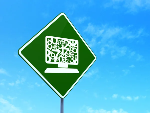 Education concept: Computer Pc on road sign background — Stock Photo, Image