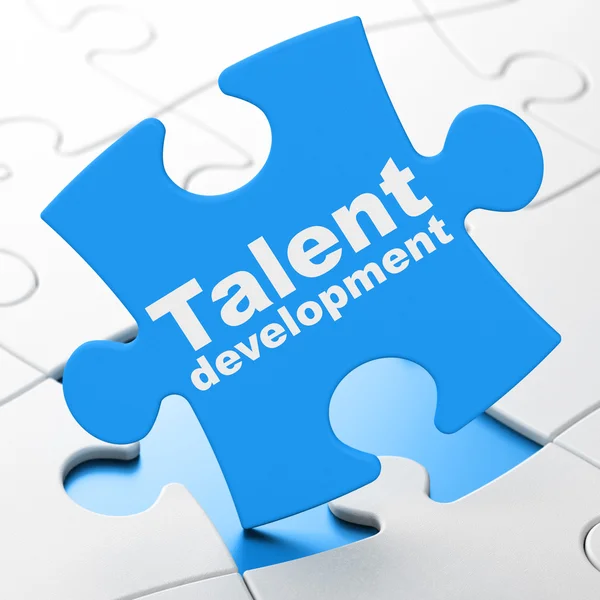 Onderwijs concept: talentontwikkeling op puzzel achtergrond — Stockfoto