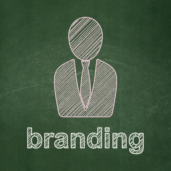 Koncepcja marketingu: człowiek biznesu i marki na tle tablica — Zdjęcie stockowe