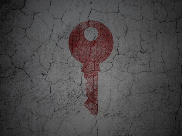 Protection concept: Key on grunge wall background — Stock Photo, Image