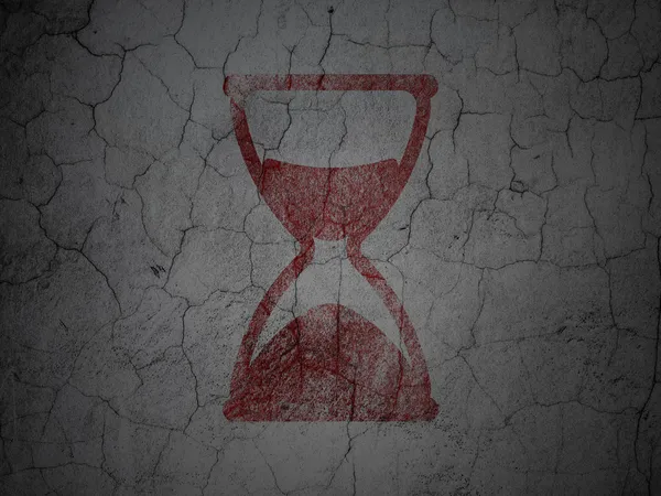 Timeline concept: Hourglass on grunge wall background — Stock Photo, Image