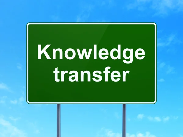 Education concept: Knowledge Transfer on road sign background — Stock Photo, Image