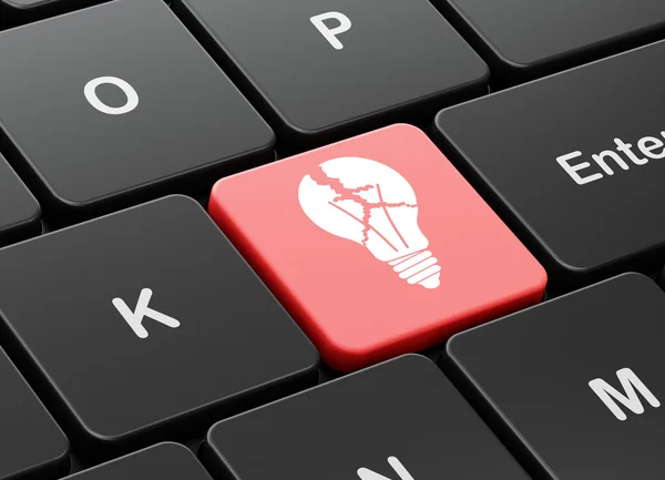 Finance concept: Light Bulb on computer keyboard background — Stock Photo, Image