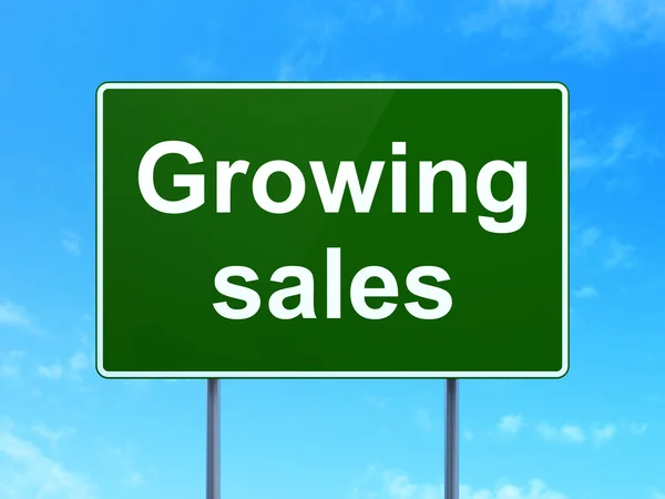 Finance concept: Growing Sales on road sign background — Stock Photo, Image
