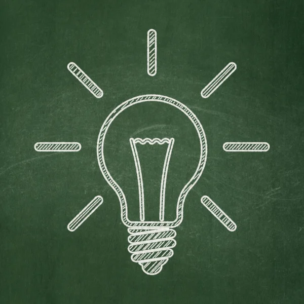 Business concept: Light Bulb on chalkboard background — Stock Photo, Image