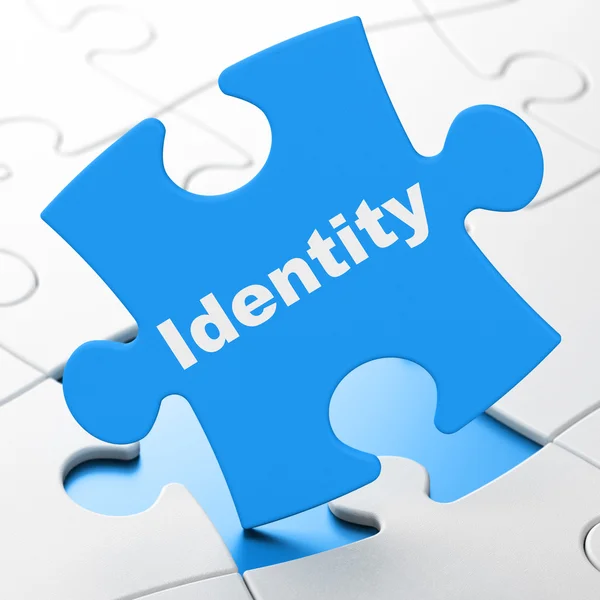 Veiligheidsconcept: identiteit op puzzel achtergrond — Stockfoto