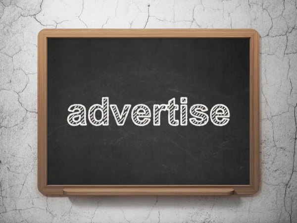 Advertising concept: Advertise on chalkboard background — Stock Photo, Image