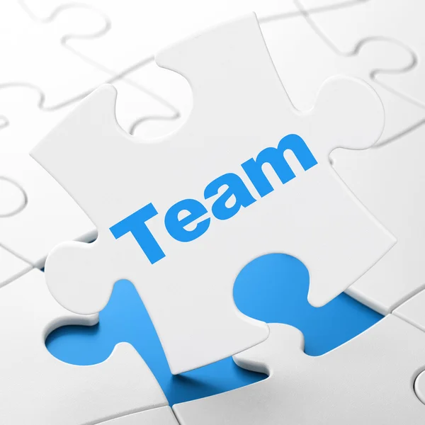 Bedrijfsconcept: team op puzzel achtergrond — Stockfoto