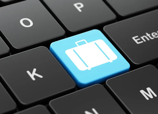 Tourism concept: Bag on computer keyboard background — Stock Photo, Image