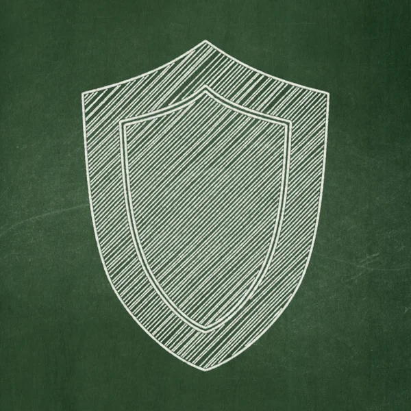 Protection concept: Shield on chalkboard background — Stock Photo, Image