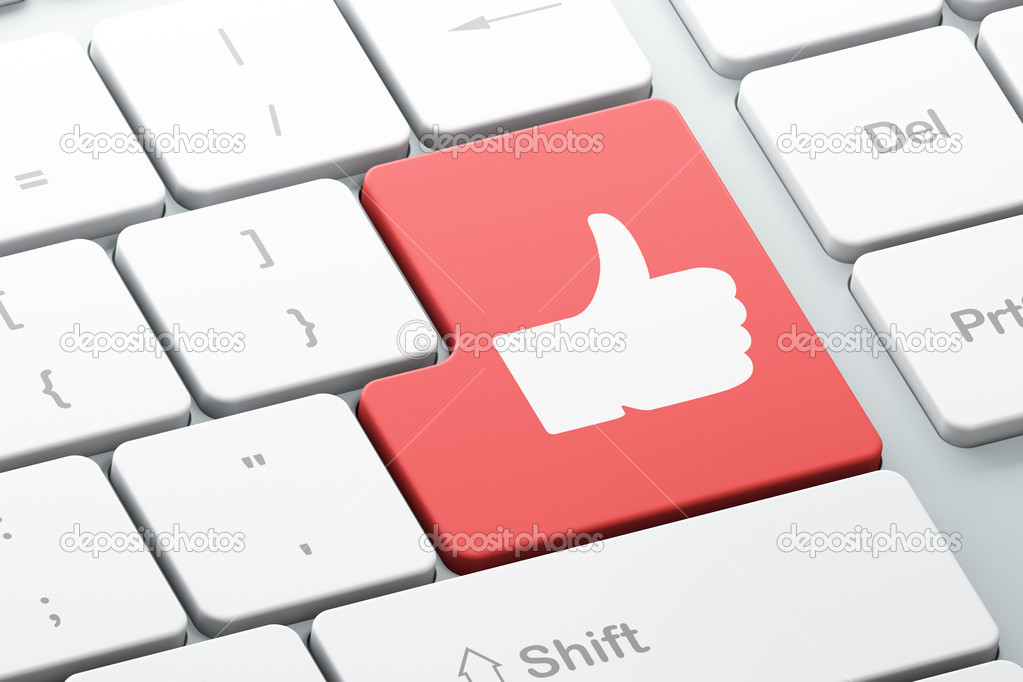 Social network concept: Thumb Up on computer keyboard background