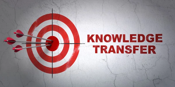 Education concept: target and Knowledge Transfer on wall background — Stock Photo, Image