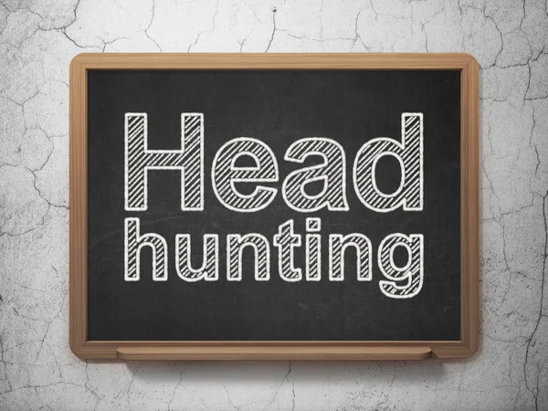 Conceito de negócio: Head Hunting em fundo quadro-negro — Fotografia de Stock