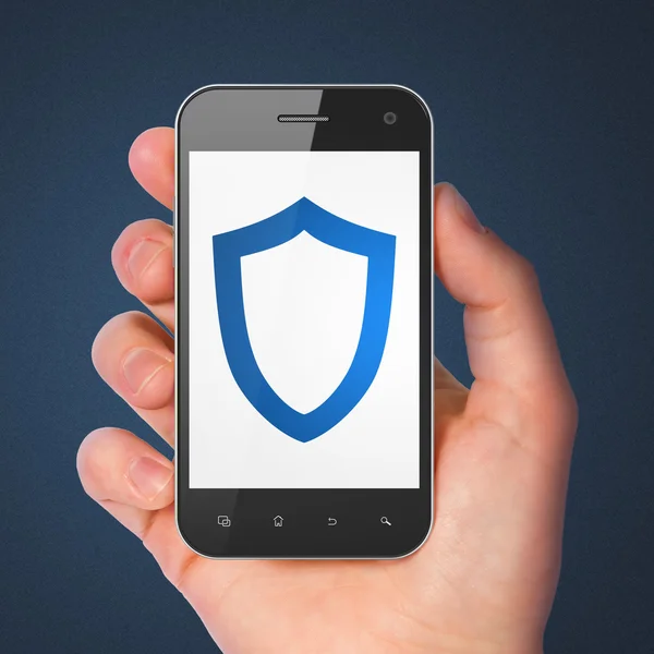 Concetto di sicurezza: scudo sagomato su smartphone — Foto Stock