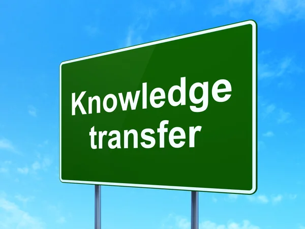 Education concept: Knowledge Transfer on road sign background — Stock Photo, Image