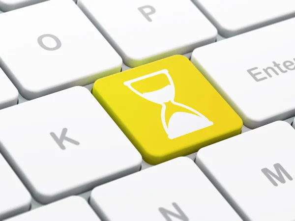 Time concept: Hourglass on computer keyboard background — Stock Photo, Image