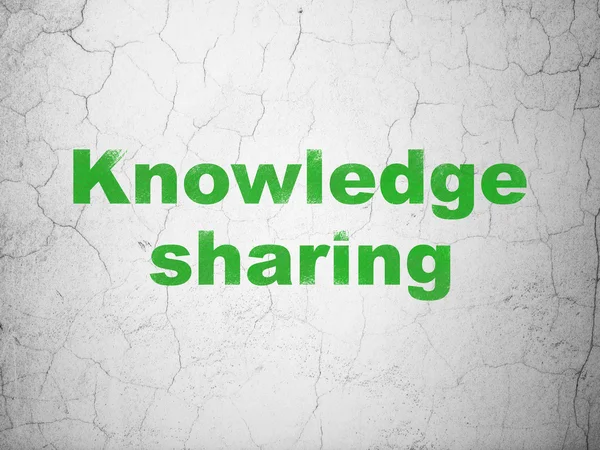 Education concept: Knowledge Sharing on wall background — Stock Photo, Image