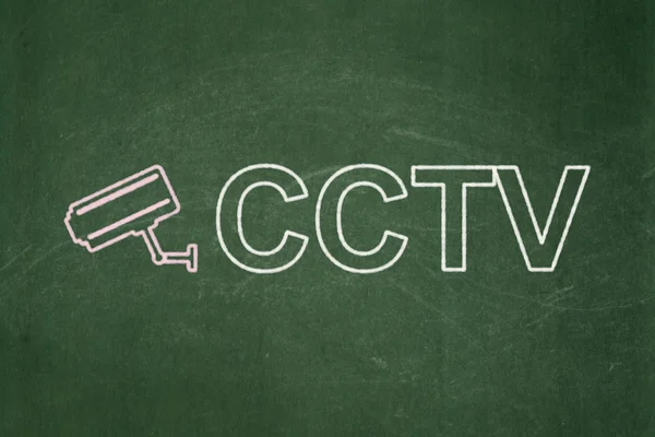 Conceito de segurança: Cctv Camera e CCTV em fundo quadro-negro — Fotografia de Stock