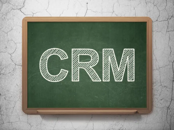 Business concept: CRM on chalkboard background — Stock Photo, Image