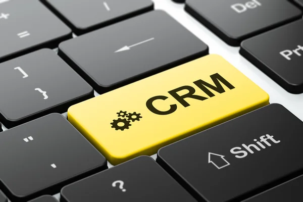 Business concept: Gears and CRM on computer keyboard background — Stock Photo, Image