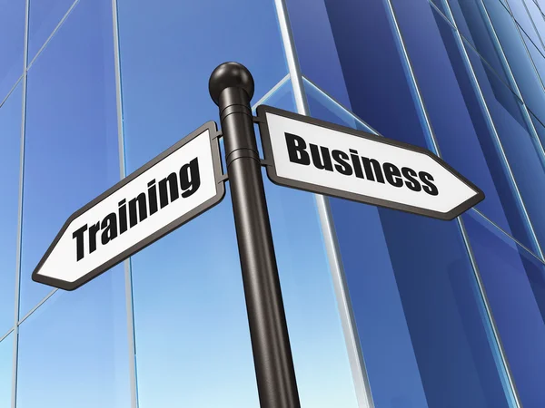 Conceito de educação: assinar Business Training on Building background — Fotografia de Stock