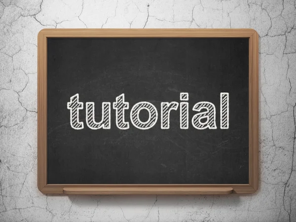 Education concept: Tutorial on chalkboard background — Stock Photo, Image