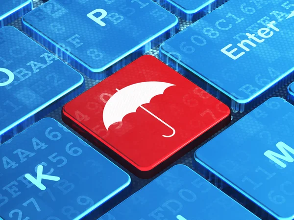 Conceito de proteção: guarda-chuva no fundo do teclado do computador — Fotografia de Stock