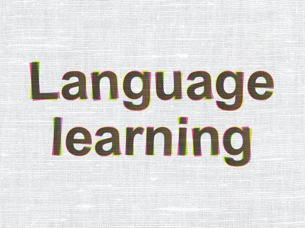Conceito de educação: Aprendizagem de línguas sobre fundo de textura de tecido — Fotografia de Stock
