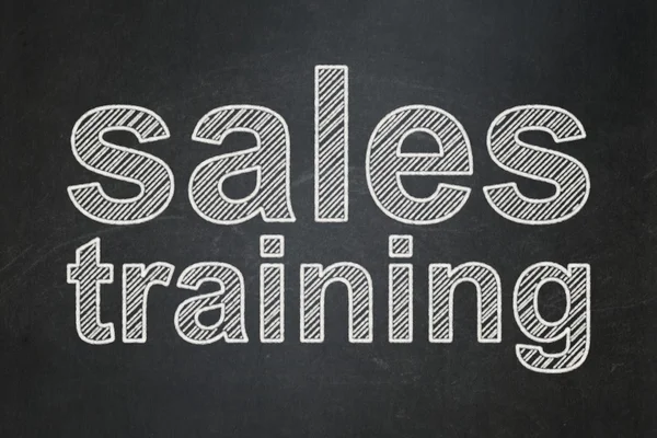 Advertising concept: Sales Training on chalkboard background