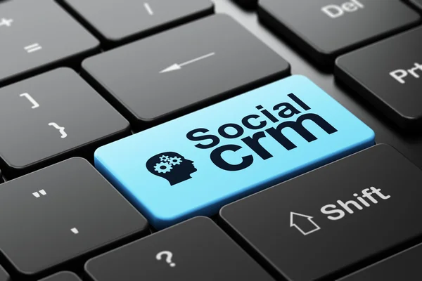 Concetto di finanza: Head With Gears e Social CRM su sfondo tastiera del computer — Foto Stock