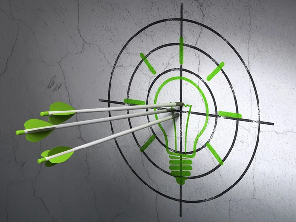 Finance concept: arrows in Light Bulb target on wall background — Stock Photo, Image